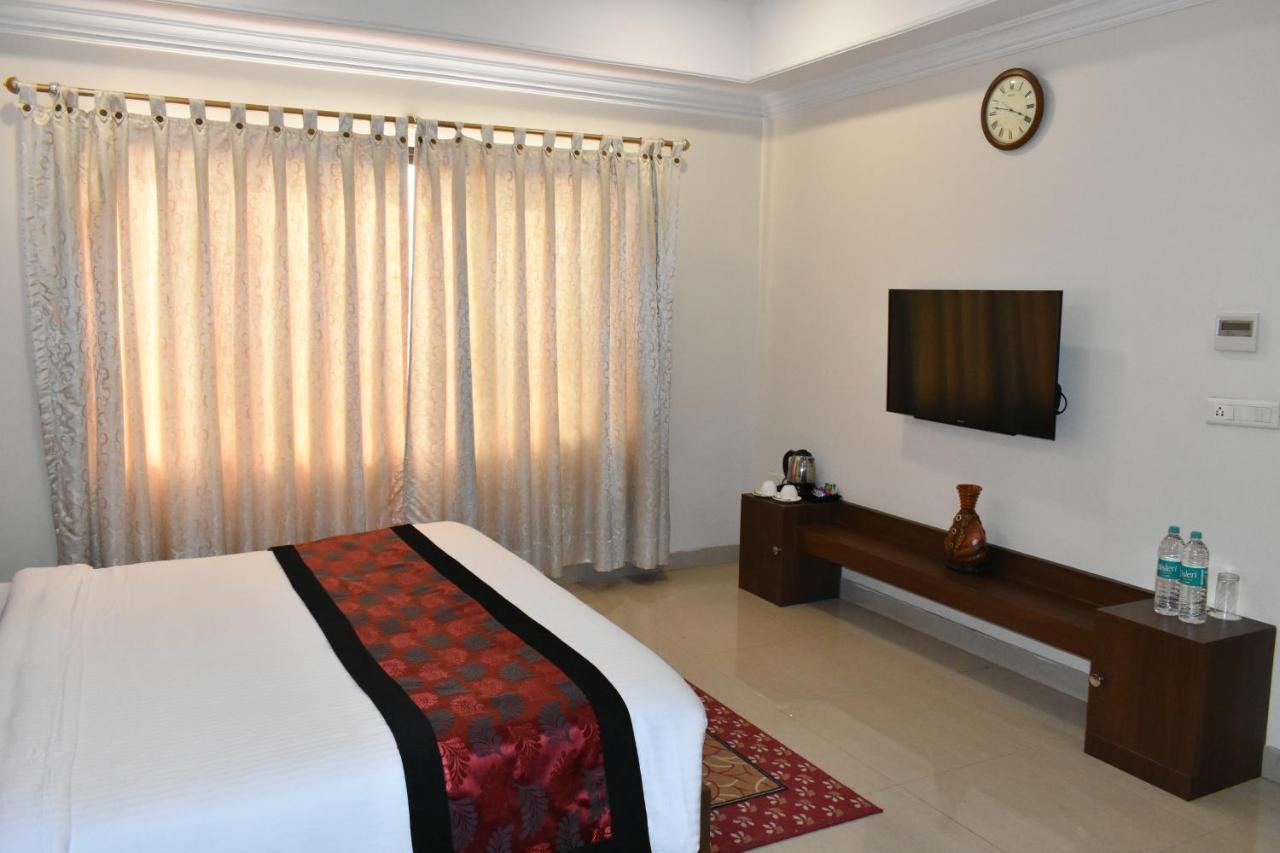 The Orchard Hotel Jharsuguda Buitenkant foto